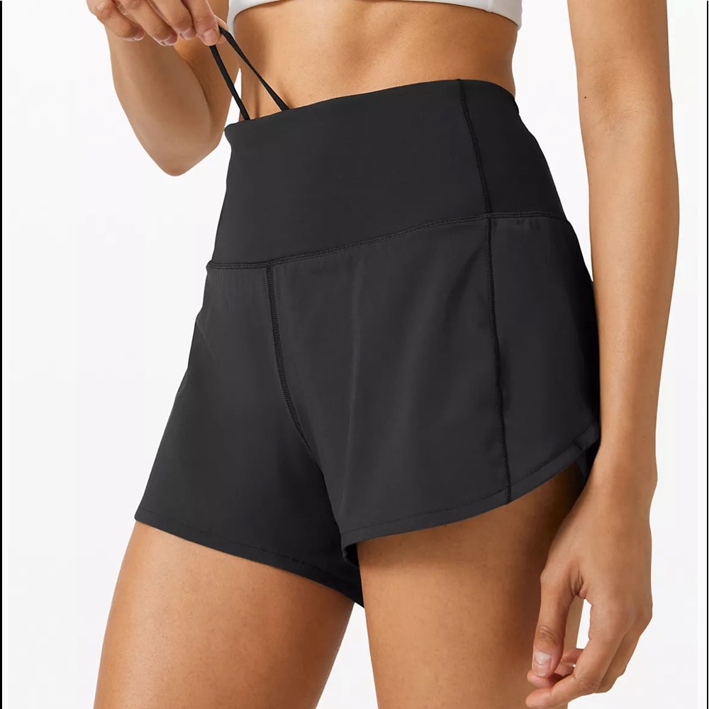 Speed Up High-Rise Short 4" Black. Worn on…